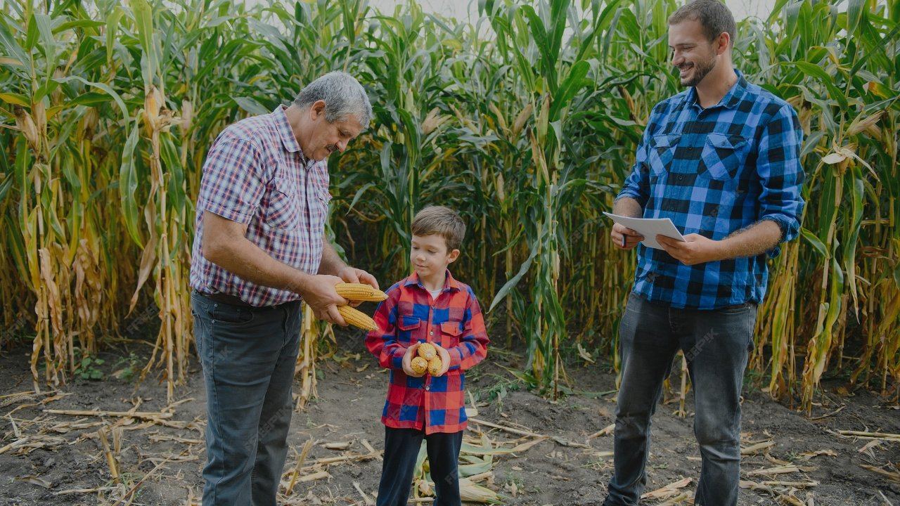 Multi-generational farming family in corn field